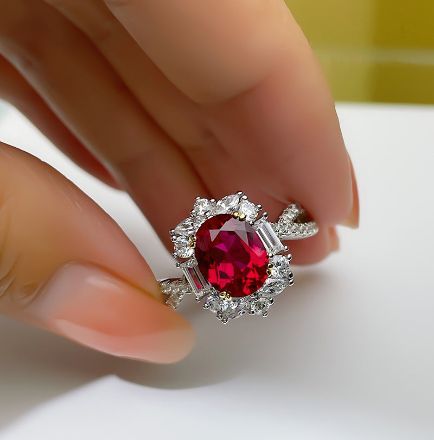 Picture of Vintage Twist 1.0 Carat Oval Cut Ruby Engagement Ring In Sterling Silver