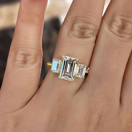 Picture of Stunning Yellow Gold Emerald Cut Three Stone Engagement Ring In Sterling Silver