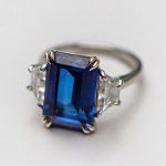 Picture of Luxurious Blue Sapphire Emerald Cut Three Stone Engagement Ring In Sterling Silver