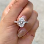 Picture of Exclusive Twist Oval Cut Simulated Diamond Engagement Ring In Sterling Silver