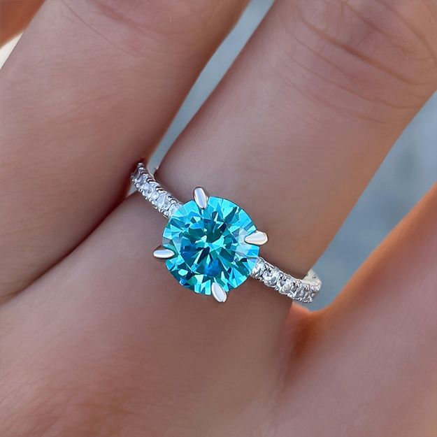 Picture of Elegant Round Cut Light Aquamarine Blue Engagement Ring In Sterling Silver