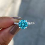 Picture of Elegant Round Cut Light Aquamarine Blue Engagement Ring In Sterling Silver