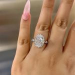 Picture of Exclusive Halo Oval Cut Moissanite Diamond Engagement Ring In Sterling Silver