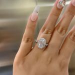 Picture of Exclusive Halo Oval Cut Moissanite Diamond Engagement Ring In Sterling Silver