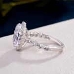 Picture of Exclusive Halo Oval Cut Moissanite Diamond Engagement Ring In Sterling Silver