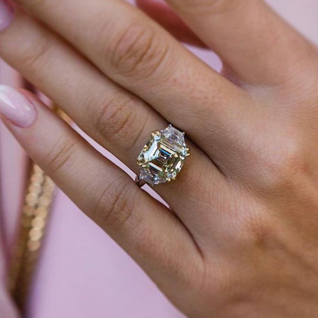 Picture of Exclusive Emerald Cut Three Stone Yellow Sapphire Engagement Ring In Sterling Silver