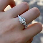 Picture of Exclusive Round Cut Three Stone Engagement Ring In Sterling Silver