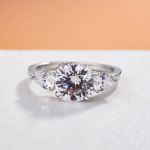 Picture of Exclusive Round Cut Three Stone Engagement Ring In Sterling Silver