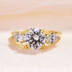 Picture of Exclusive Yellow Gold Round Cut Three Stone Engagement Ring In Sterling Silver