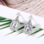 Bortwide Vintage Flower Halo Emerald Cut Sterling Silver Drop Earrings