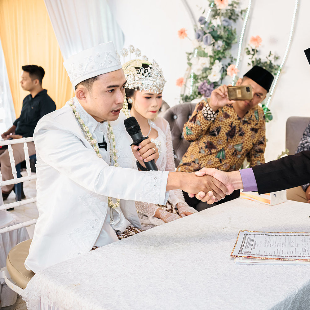 Bride and groom exchanging vows during sacred wedding ceremony with emotional expressions and elegant traditional attire