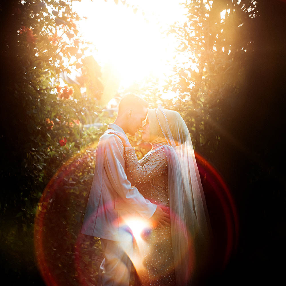 Elegant wedding reception hall decorated with luxurious floral arrangements crystal chandeliers and romantic lighting