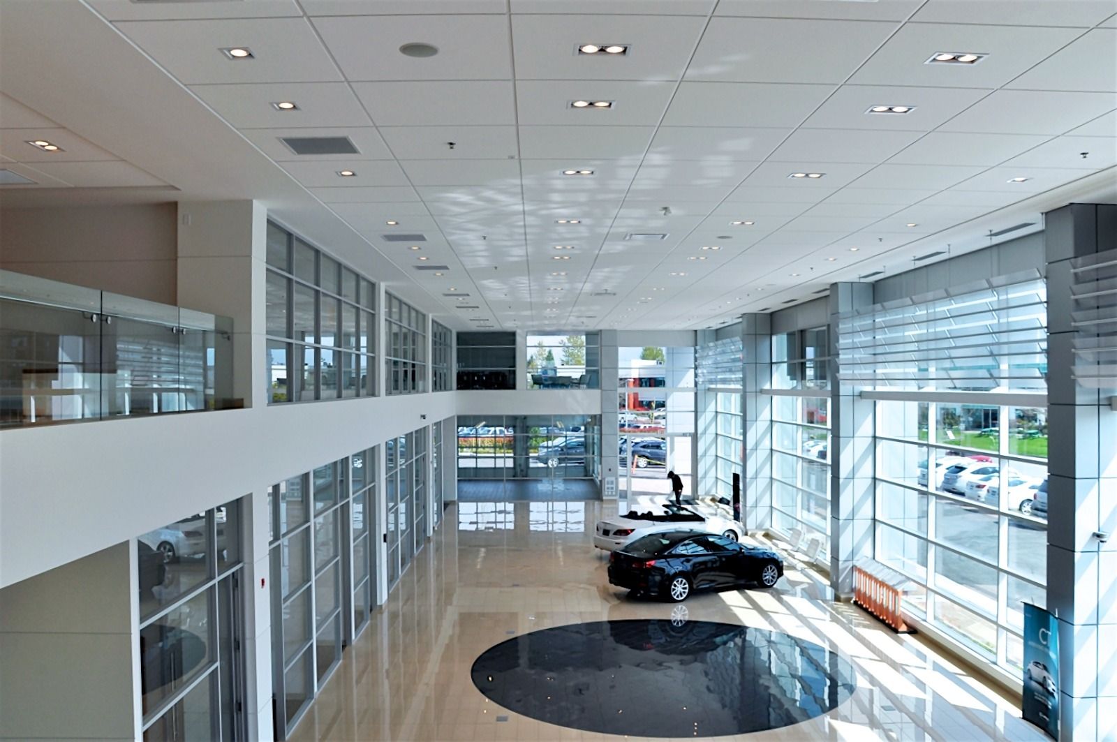 Bright and spacious luxury car dealership showroom