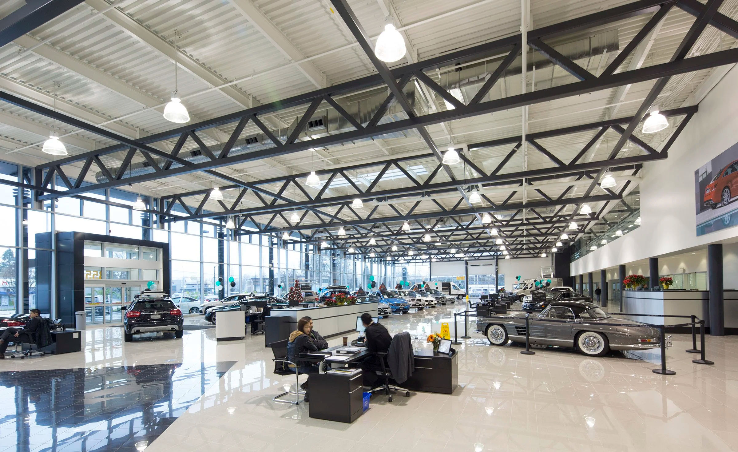 High-end showroom interior with architectural ceiling