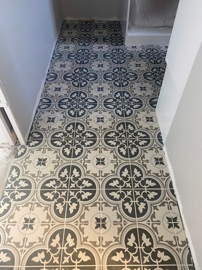 Patterned encaustic floor tile in modern Georgetown home