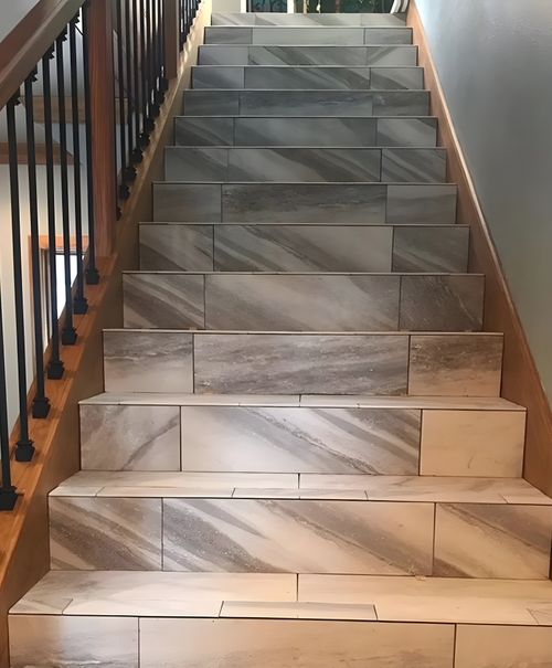 Modern staircase with large format porcelain tile in Lago Vista, Texas
