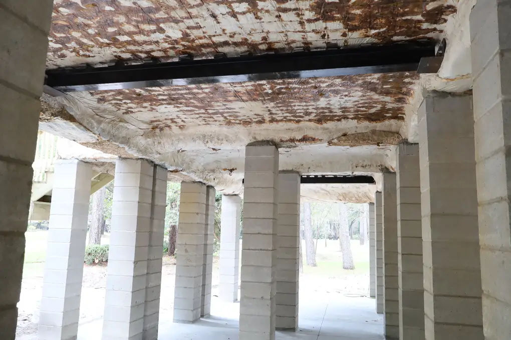 Home elevation Phase III — new foundation, piers, wood cribbing, load-bearing beams and columns, and completed lower level