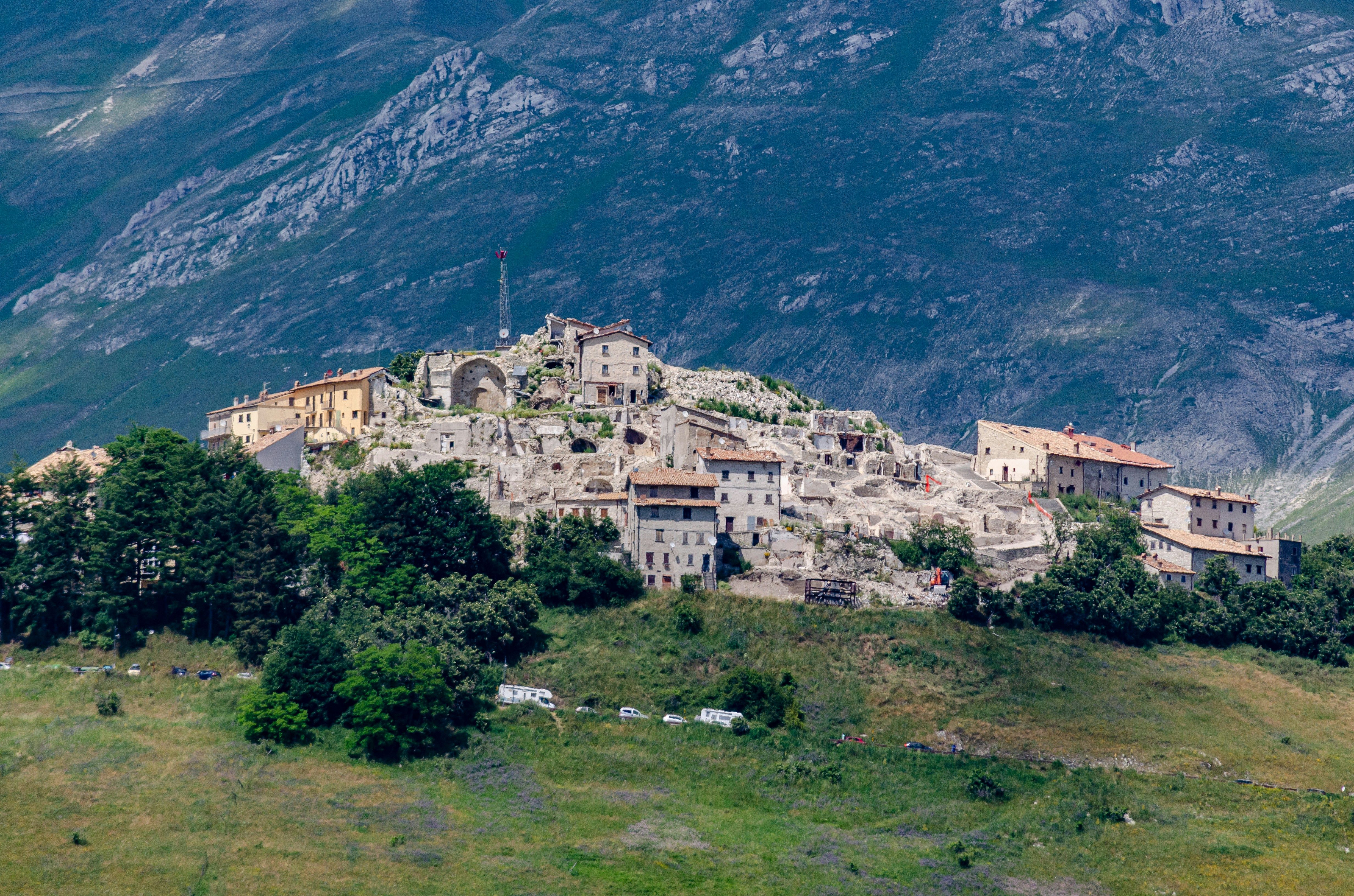 white concrete building on green grass field during daytime