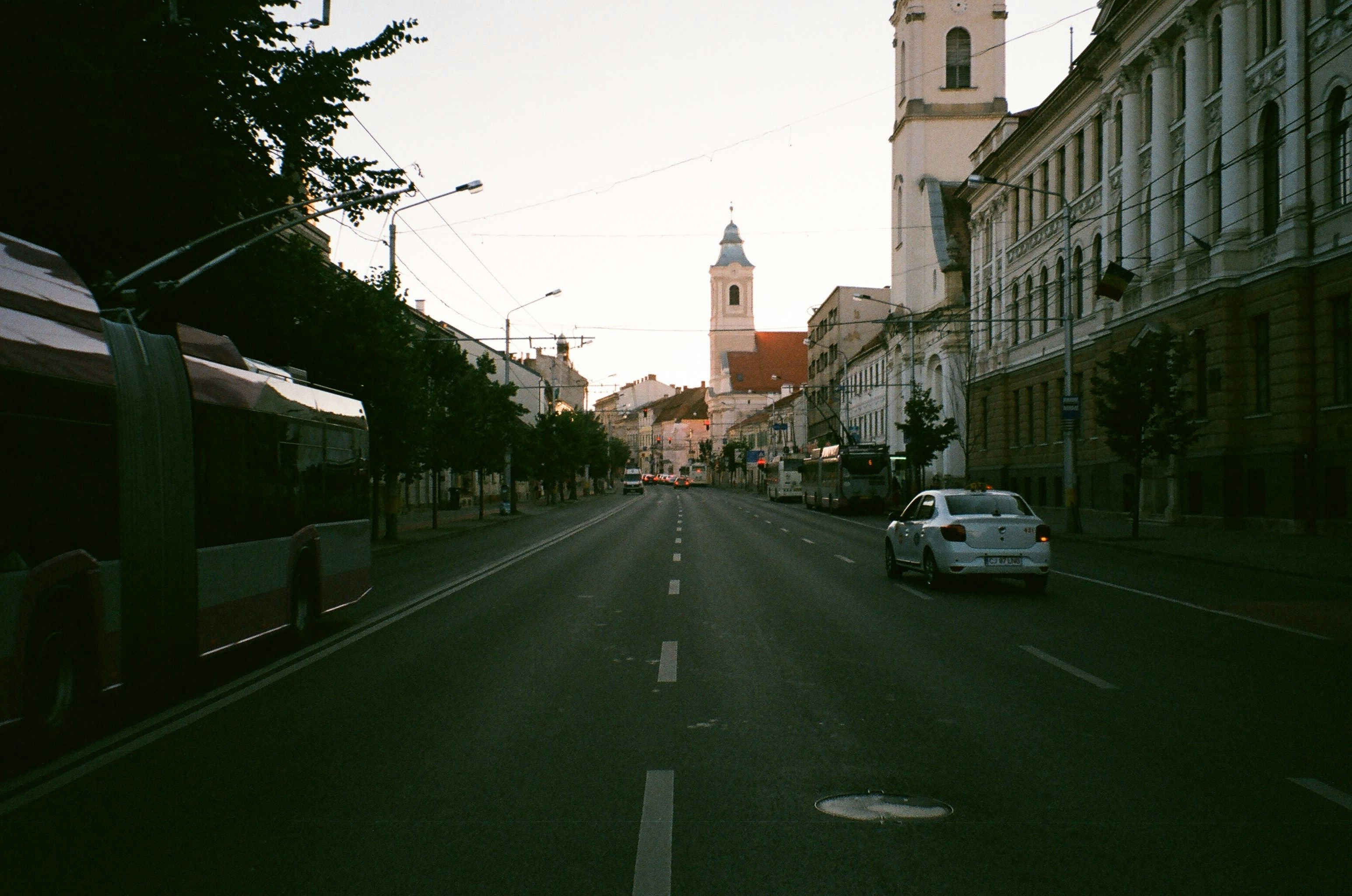cars parked on side of the road during daytime