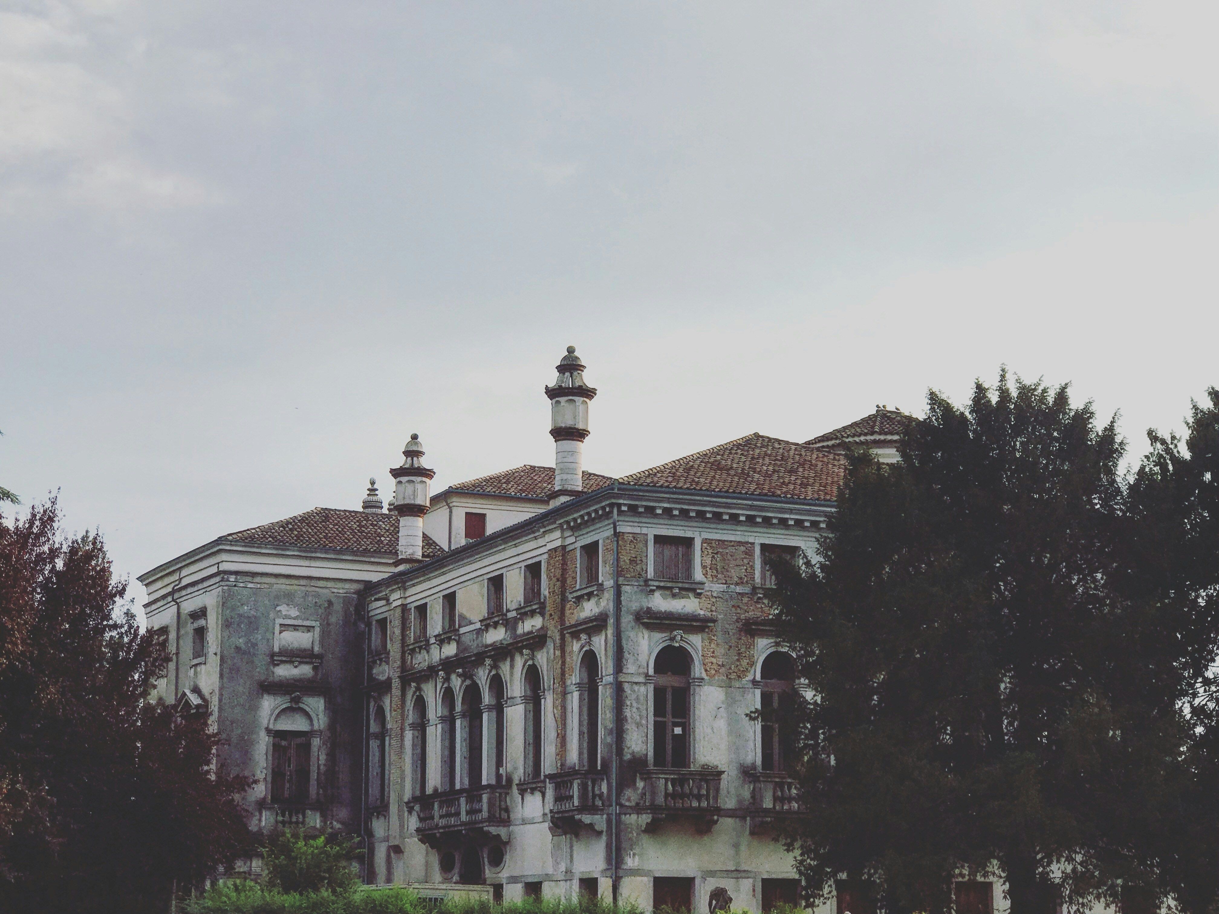 an old building with a clock tower on top of it