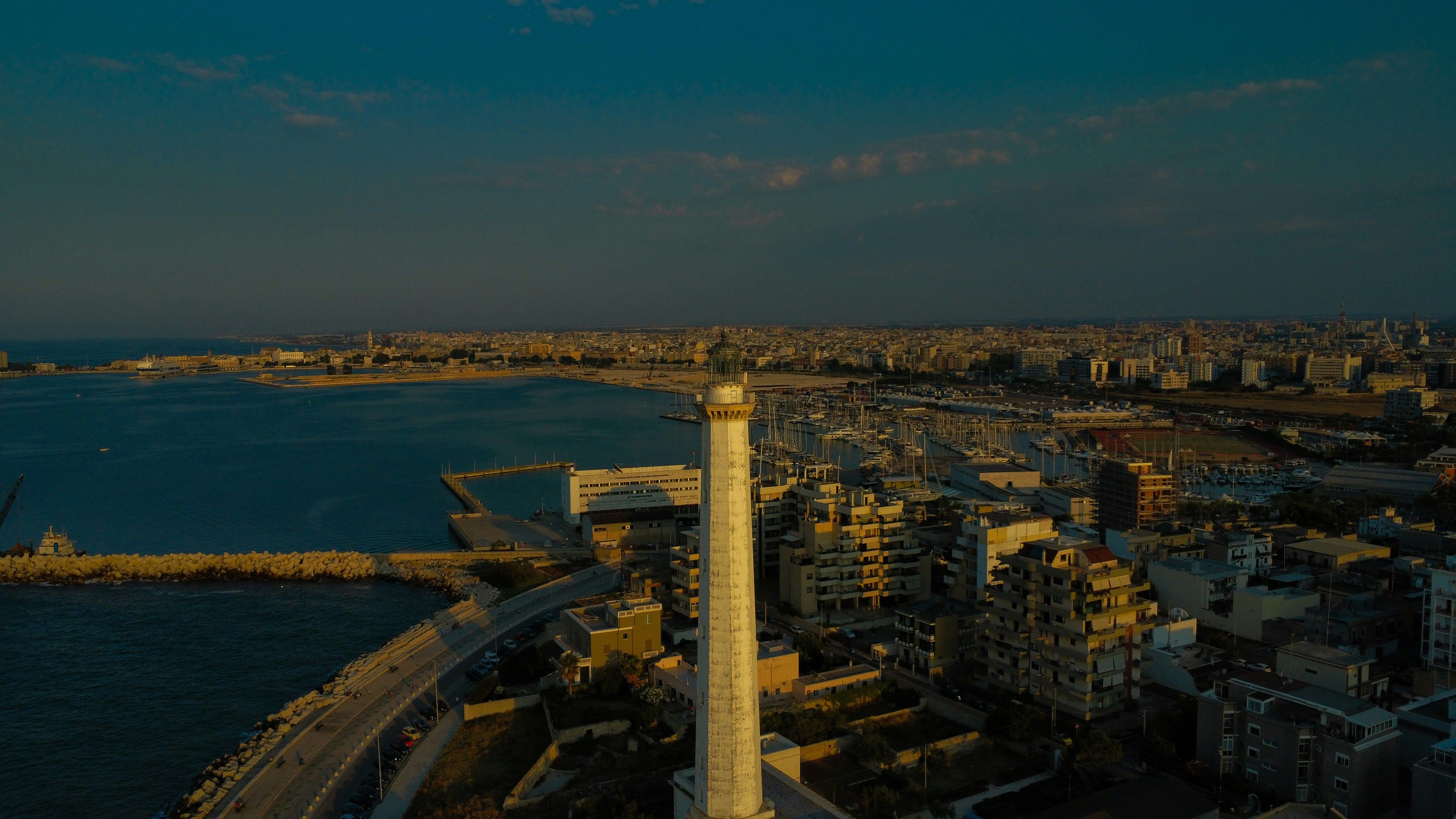An aerial view of a city and a body of water