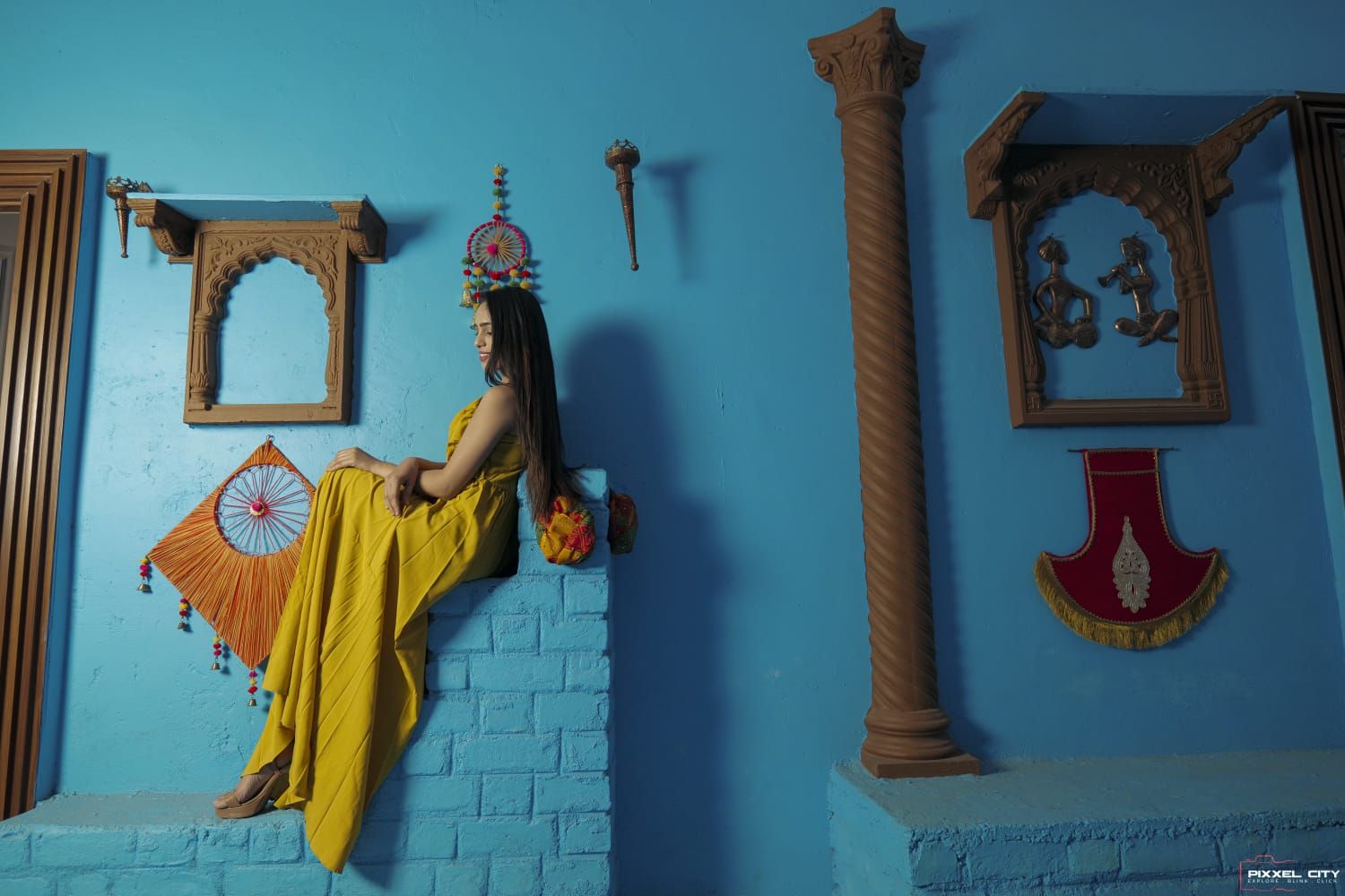 Blue Jodhpur themed photography set at Pixxel City Nagpur - Cultural backdrop with azure walls and white motifs for professional portrait sessions in Nagpur