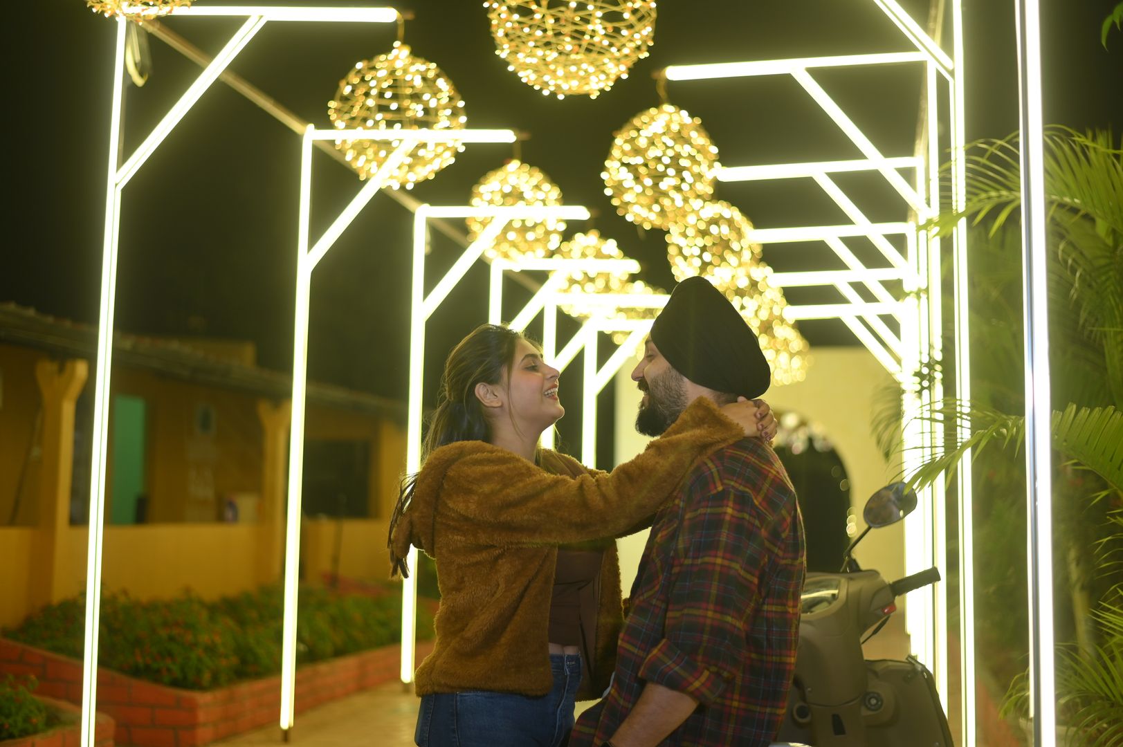 Luminous Pathway with glowing LED arches and golden illumination for magical portrait photography located in Nagpur SEDO