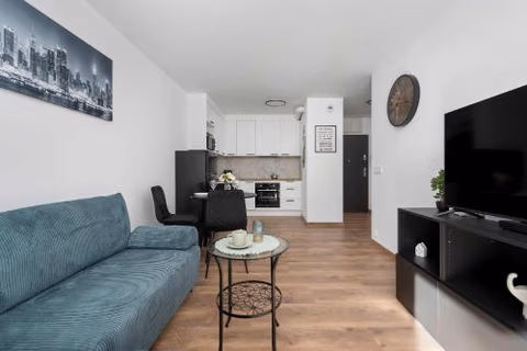 Elegant White Apartment with Terrace & Parking in Wrocław by Noclegi Renters — foto 9