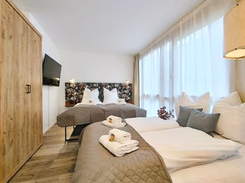 Design Apartment für bis zu 4 im 2 OG, modern, Dachterrasse, Grill, ruhige Lage, Disney plus, Wii, LAN und WLAN — foto 7