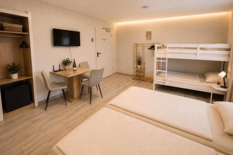Hotel Prime Living Apartments Küche Netflix — foto 9