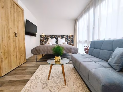 Design Apartment für bis zu 4 im 2 OG, modern, Dachterrasse, Grill, ruhige Lage, Disney plus, Wii, LAN und WLAN — foto 1