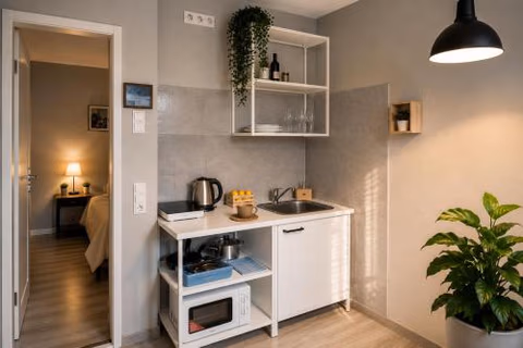 Hotel Prime Living Apartments Küche Netflix — foto 3