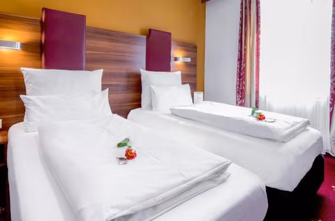 TIPTOP Hotel Burgschmiet Garni — foto 6