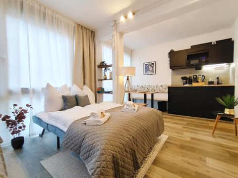 Design Apartment für bis zu 4 im 2 OG, modern, Dachterrasse, Grill, ruhige Lage, Disney plus, Wii, LAN und WLAN — foto 9