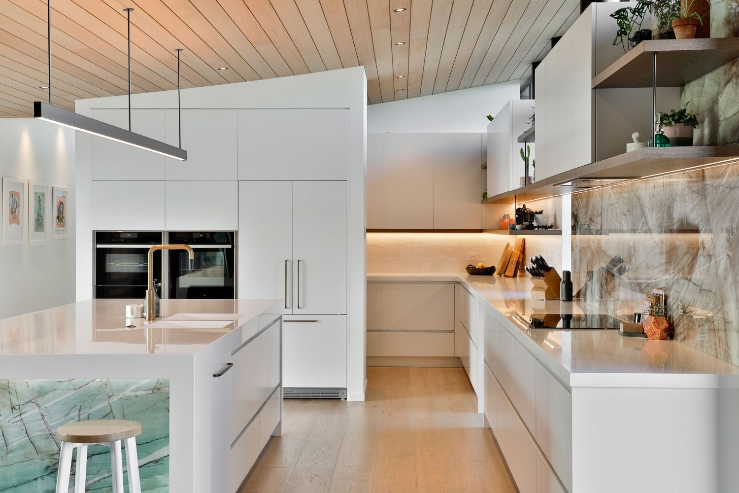 Custom cabinetry with integrated appliances in a contemporary kitchen setting.