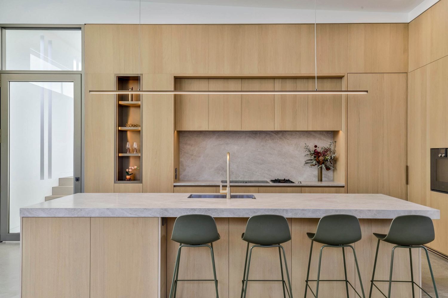 Central island kitchen designed for family living and entertaining