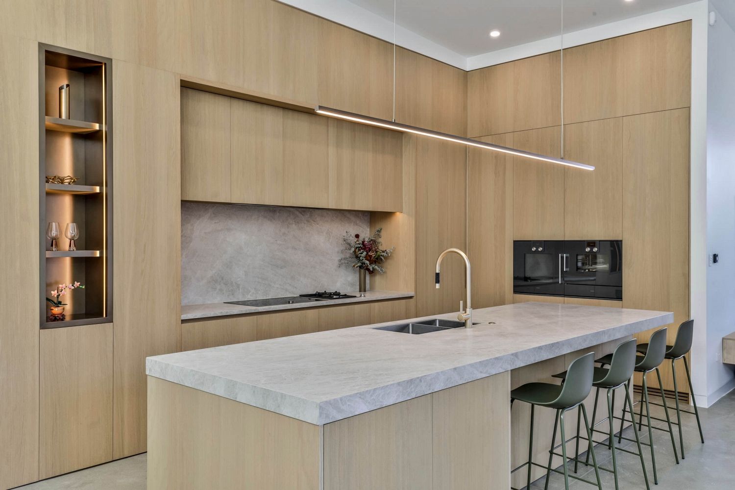 View of kitchen highlighting proportion, alignment, and material continuity