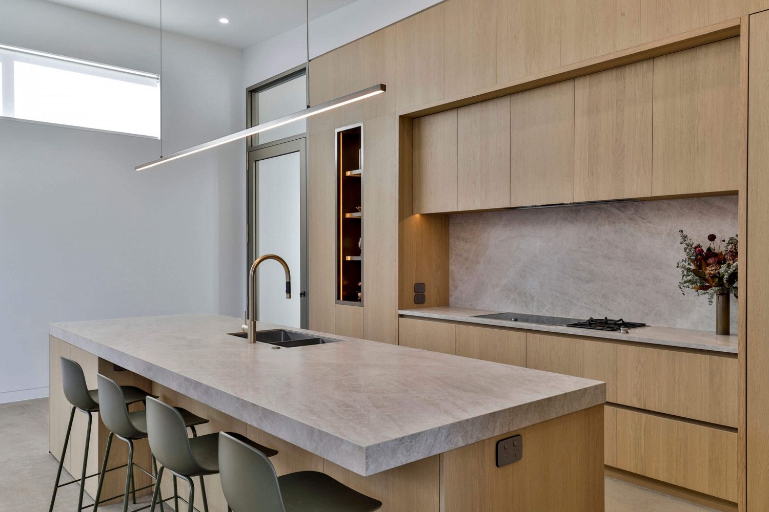 Open-plan kitchen connecting seamlessly to living areas