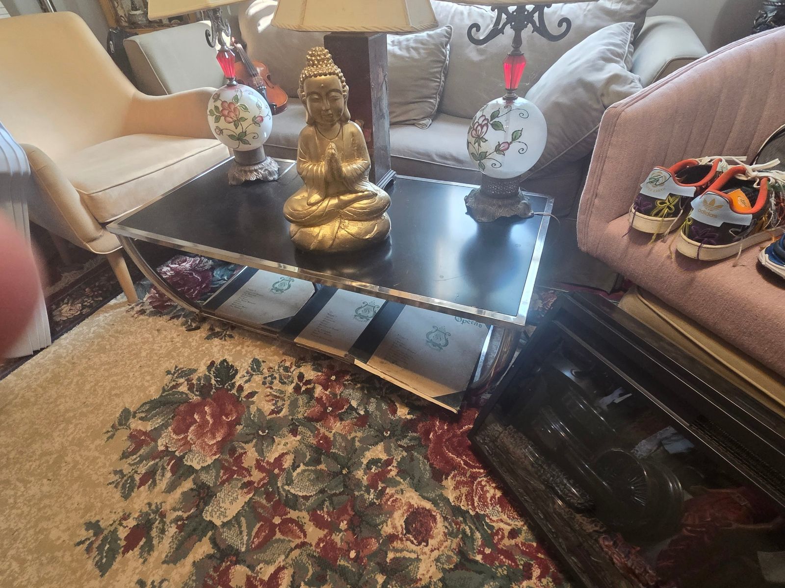 Coffee table Chrome and Black Coffee Table 48 x 24 n 18 inch tall.$65 Lamps budha 85 eac — photo 2