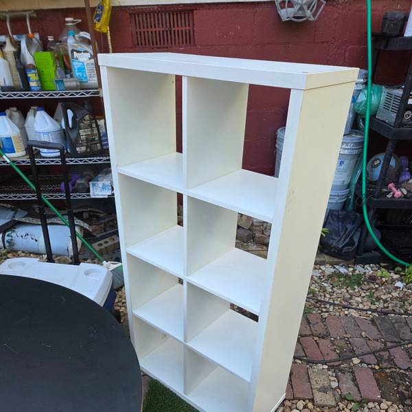 Cube 27 x 12 n 52 inch tall.  IKEA Kallax 2x4 Cube Shelving Unit