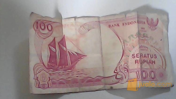 Uang kertas  lama  100 rupiah gambar  perahu pinisi tahun 