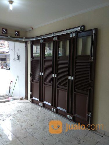 Featured image of post Pintu Garasi Besi Plat Pintu garasi besi wina ini berbahan dasar plat besi dengan proses tekuk bending dan finishing powder coating dengan teknologi tinggi didukung dengan adapun produk kami adalah pintu garasi besi menikung pintu besi lipat pintu besi tunggal swing atau kupu tarung dan komponennya