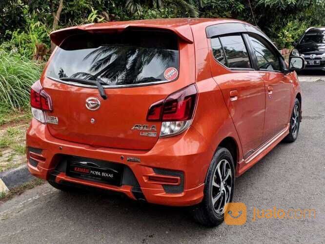 DAIHATSU AYLA 1.2 R DELUXE MT 2018 ORANGE kondisi mobil istimewa bergaransi dan dijamin siap pakai
