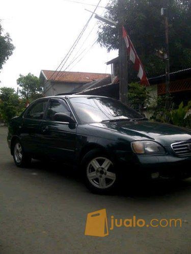  Suzuki  Baleno  Automatic Tahun 2000 tdp10 warna Hijau Tua 