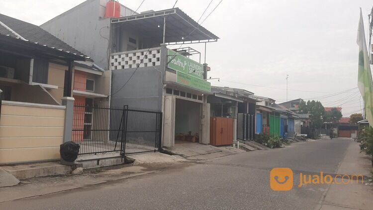 Rumah pinggir jalan utama dibekasi sewa pertahun