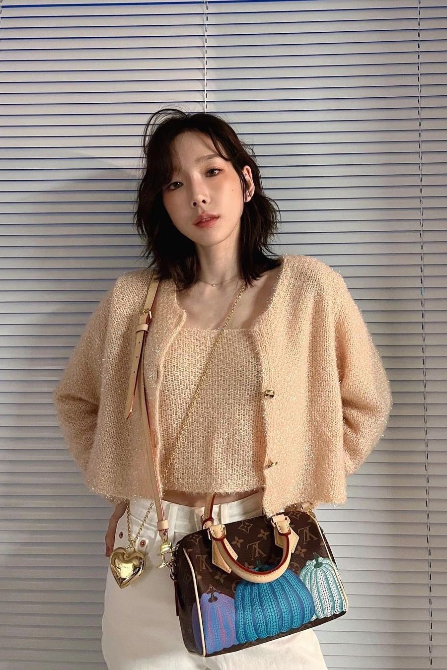 Taeyeon's Glittering Cardigan Set and Louis Vuitton Bag: A Style to Admire