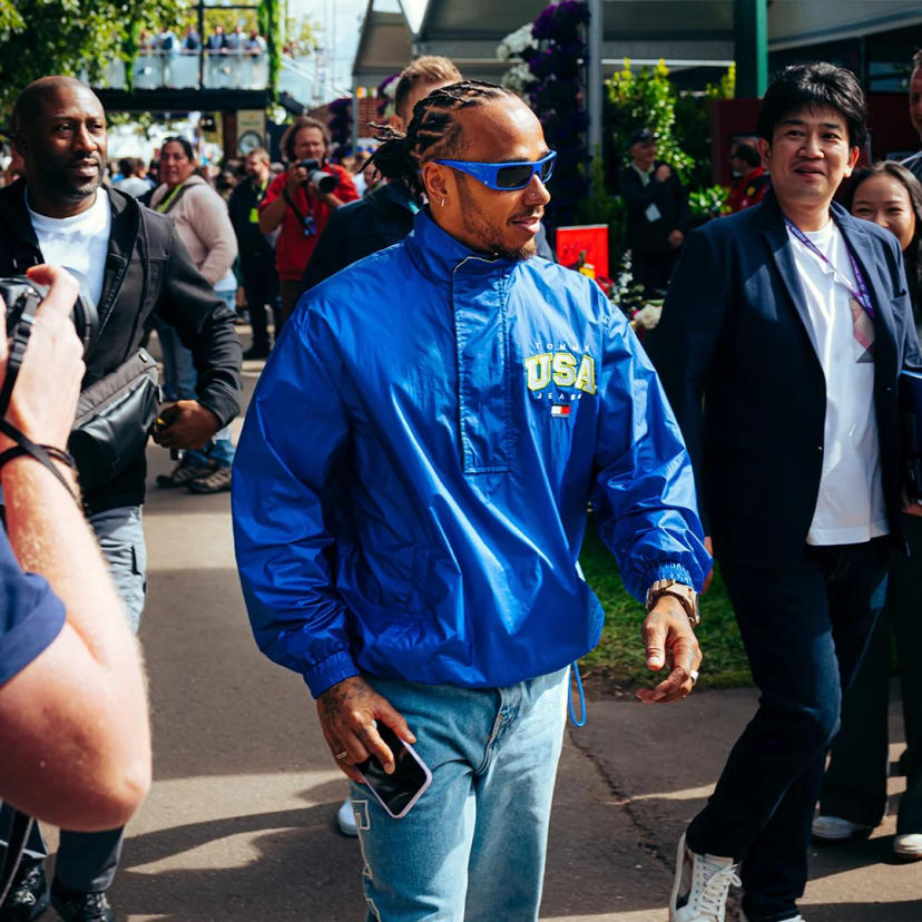 Lewis Hamilton Wears Louis Vuitton Souvenir Jacket and Sneakers at