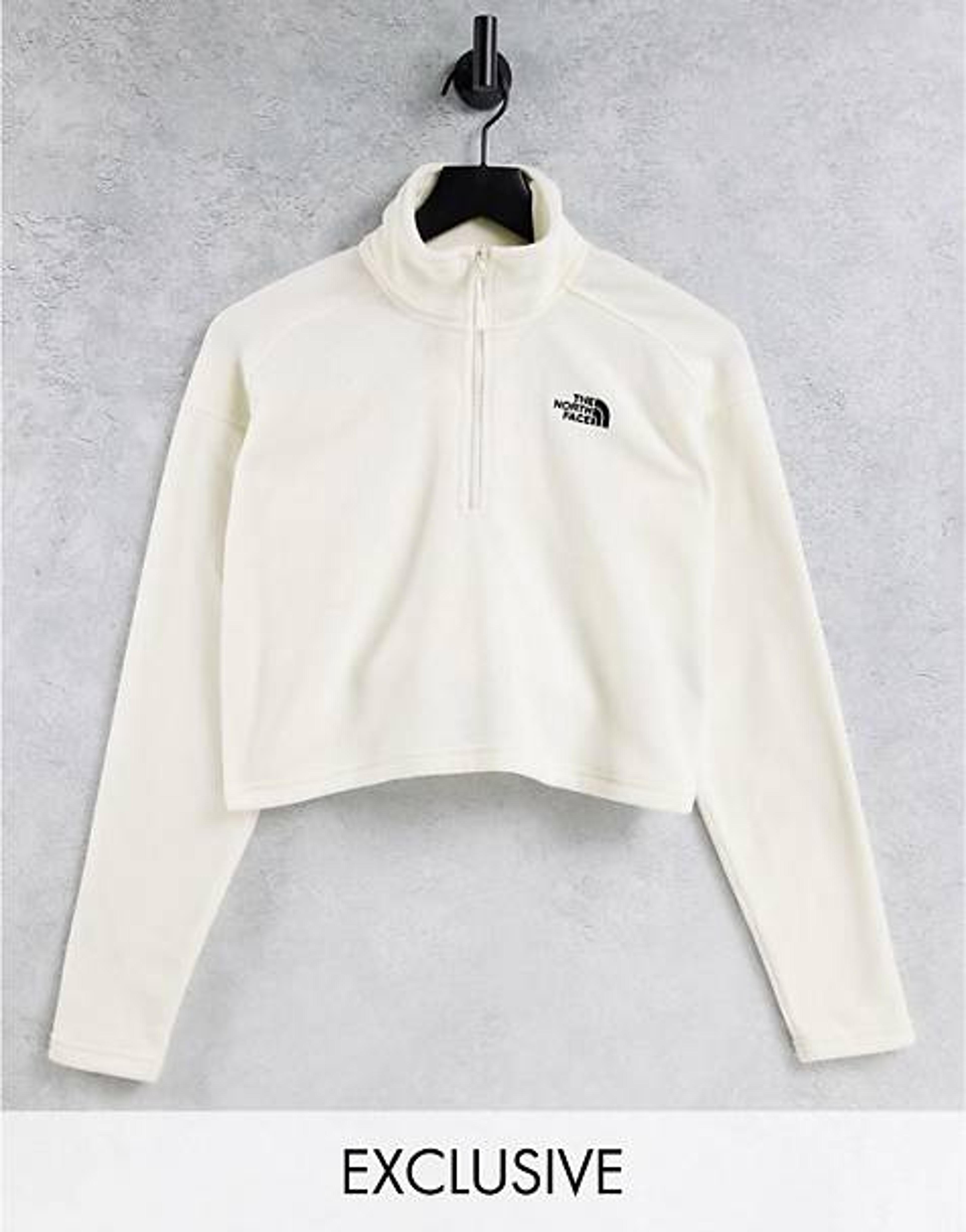 The North Face 100 Glacier 1/4 zip cropped fleece in white Exclusive at ASOS | ASOS