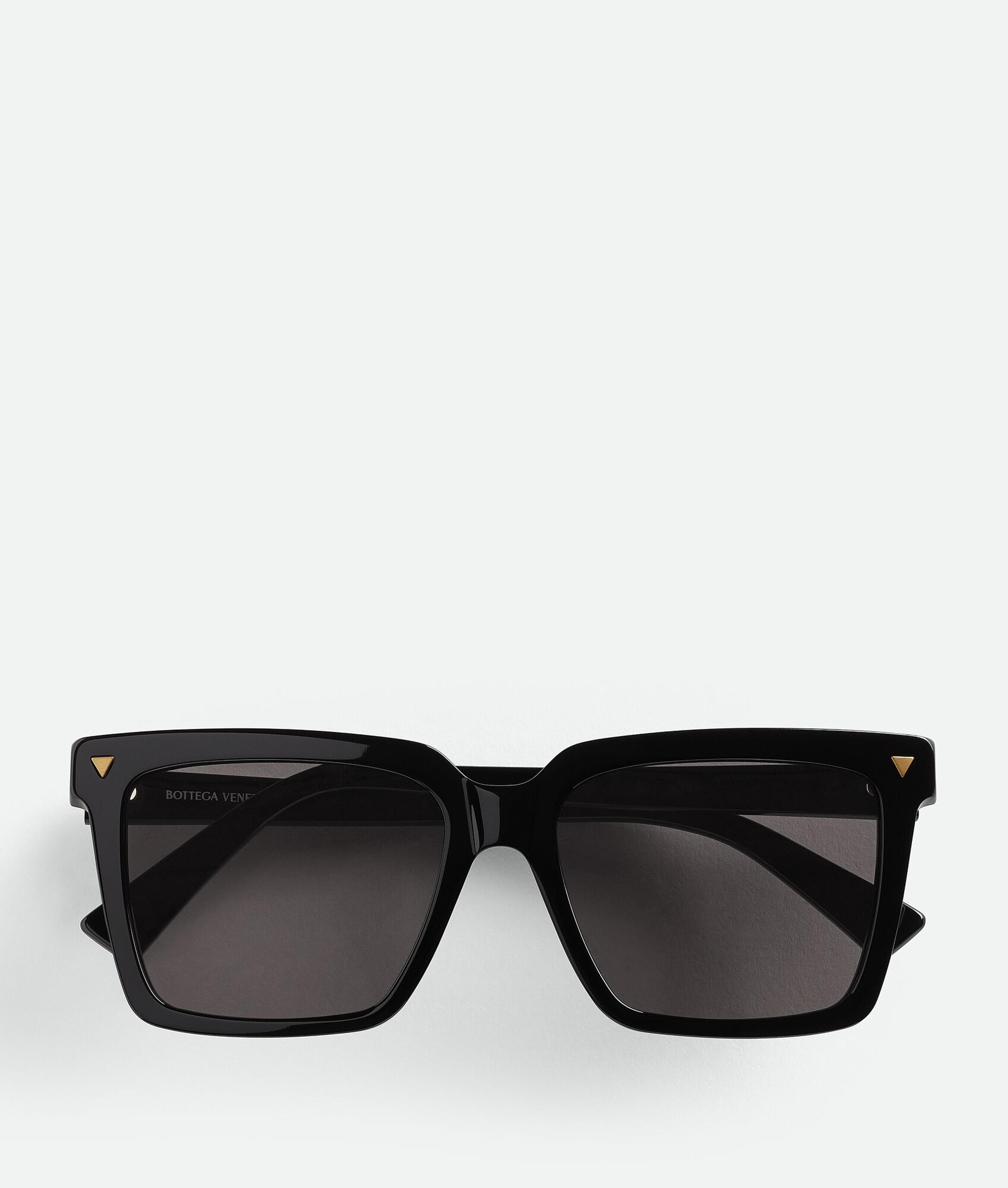 Bottega Veneta® Women's Soft Recycled Acetate Square Sunglasses in Black / Grey. Shop online now.