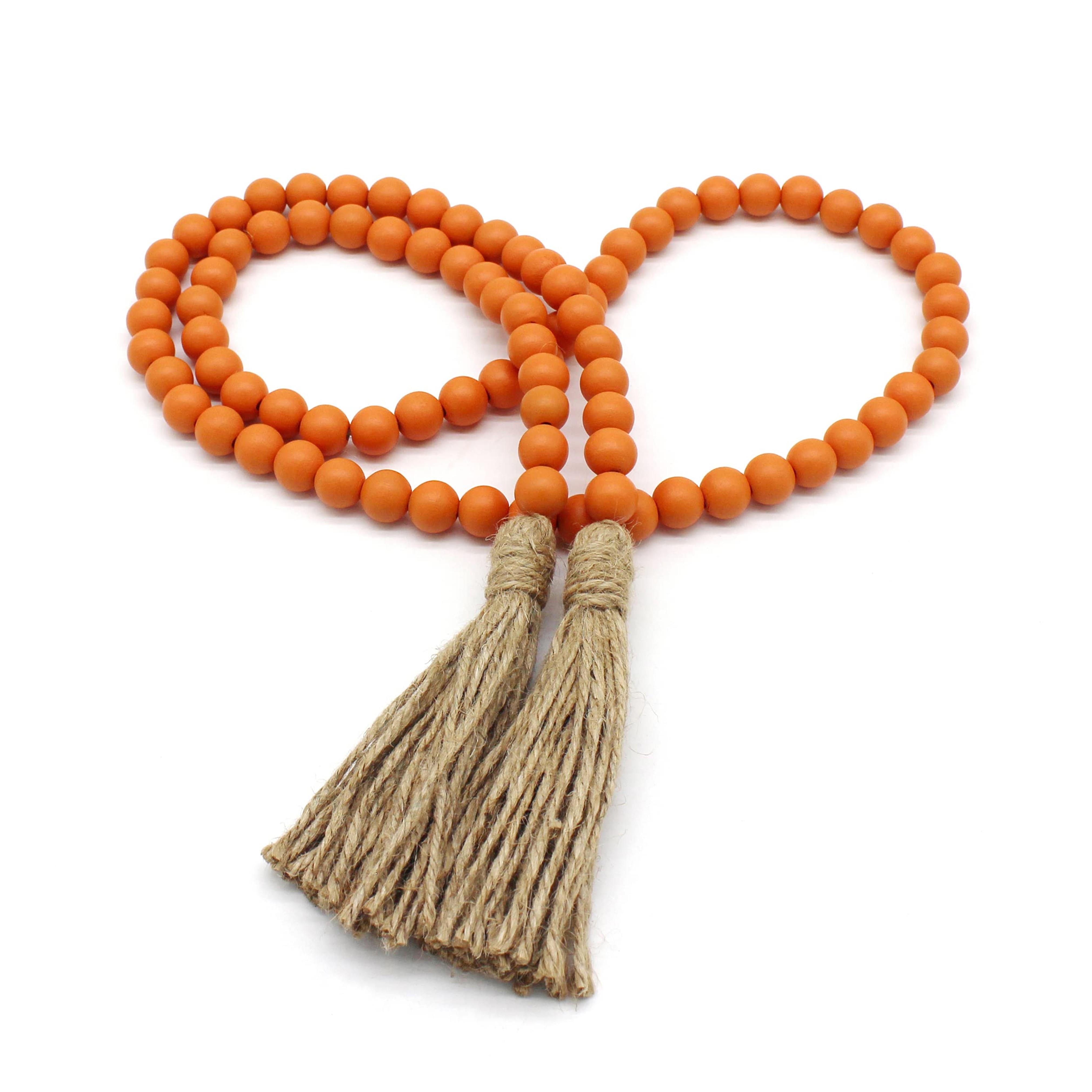 CVHOMEDECO. Wood Beads Garland with Tassels Farmhouse Rustic Wooden Prayer Bead String Wall Hanging Accent for Home Festival Decor. Orange